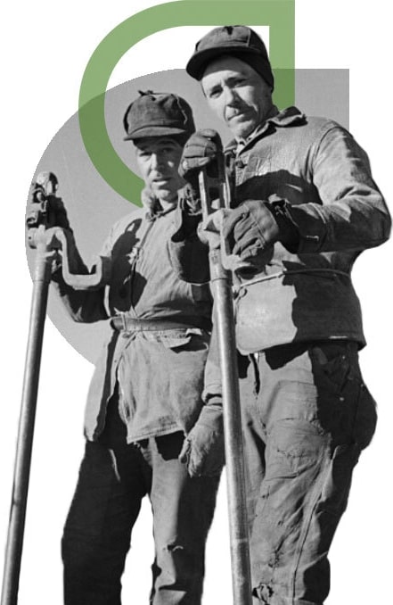 Black & white image of two construction labourers