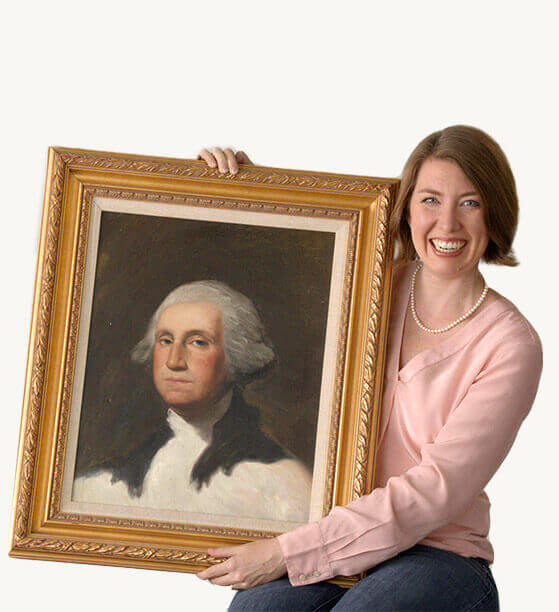 Emily holding a portrait of George Washington