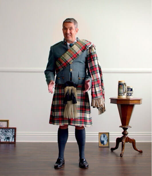 Kyle wearing traditional Scottish kilt.